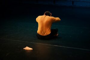 a person sitting on the ground
